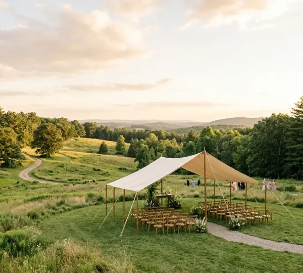 Elegant outdoor wedding tent structures set against natural landscape showcasing different tent configurations
