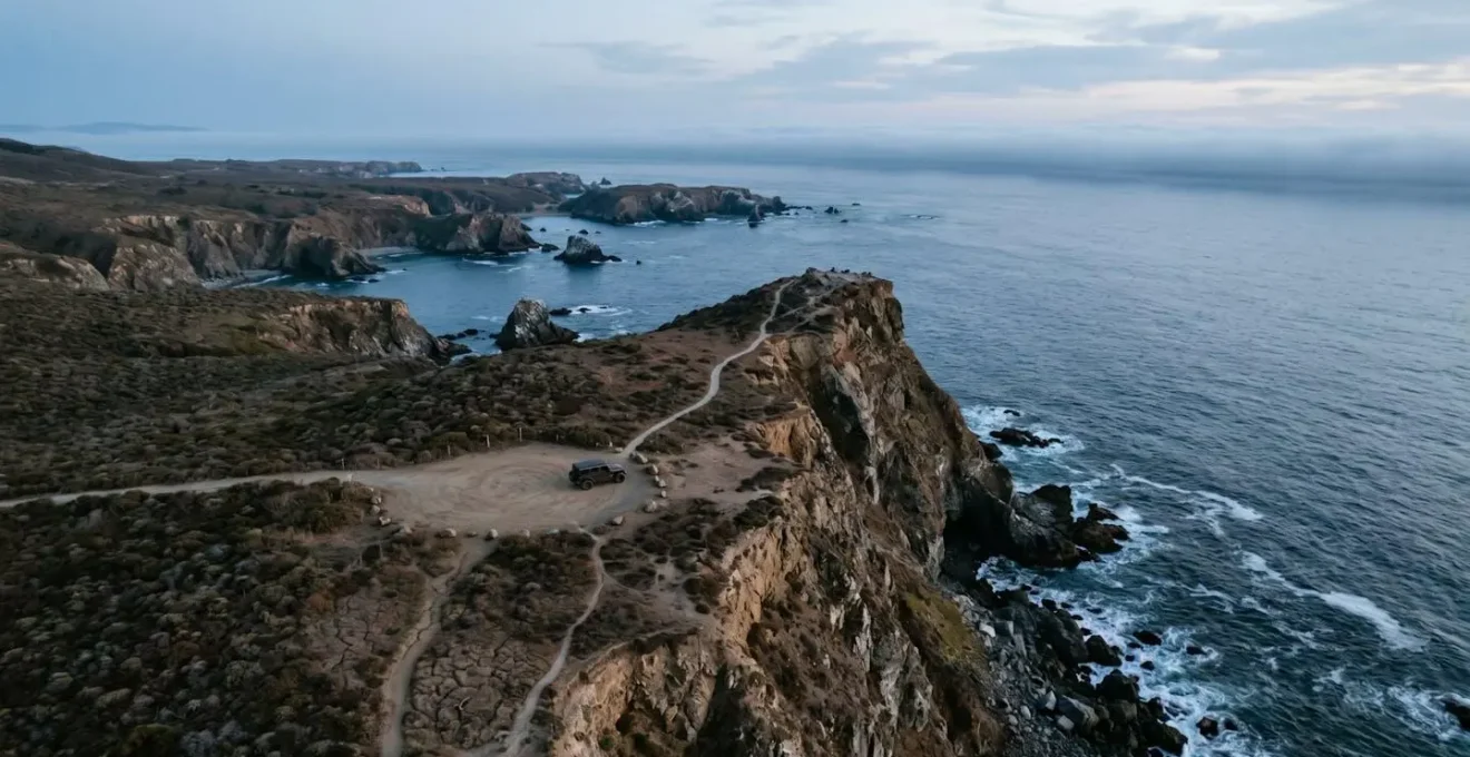 Aerial view of remote scenic location showing accessible path and dramatic vista point