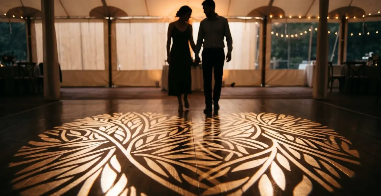 Elegant gobo lighting pattern projected on dance floor creating visual interest without text or logos